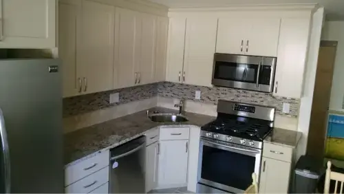 Modern kitchen remodeling service in New Jersey by Tedesco Remodeling, featuring custom cabinetry and premium countertops for a professional home renovation